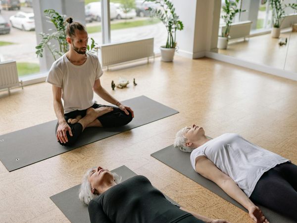 A serene setting with yoga mats ready for a class.